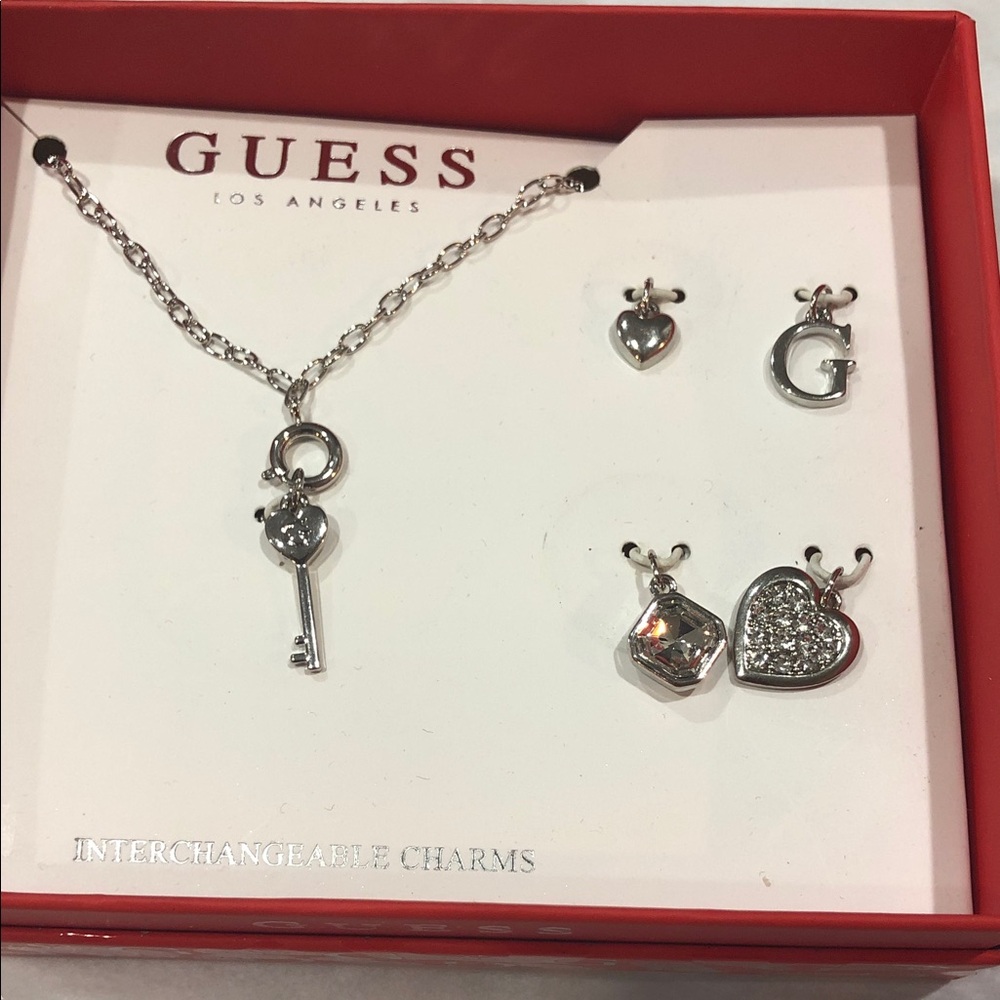Gues silver tone 20” necklace and 6 piece charm jewelry set new